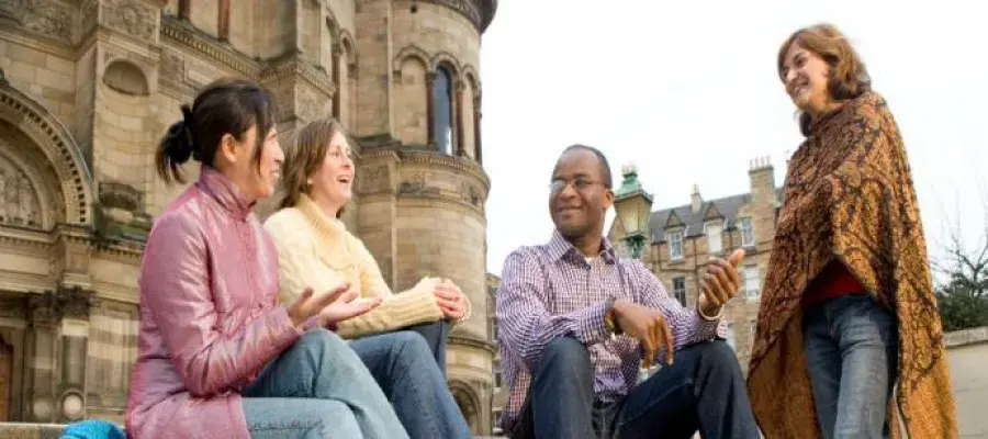 Group of people talking outside McEwan Hall, University of Edinburgh 